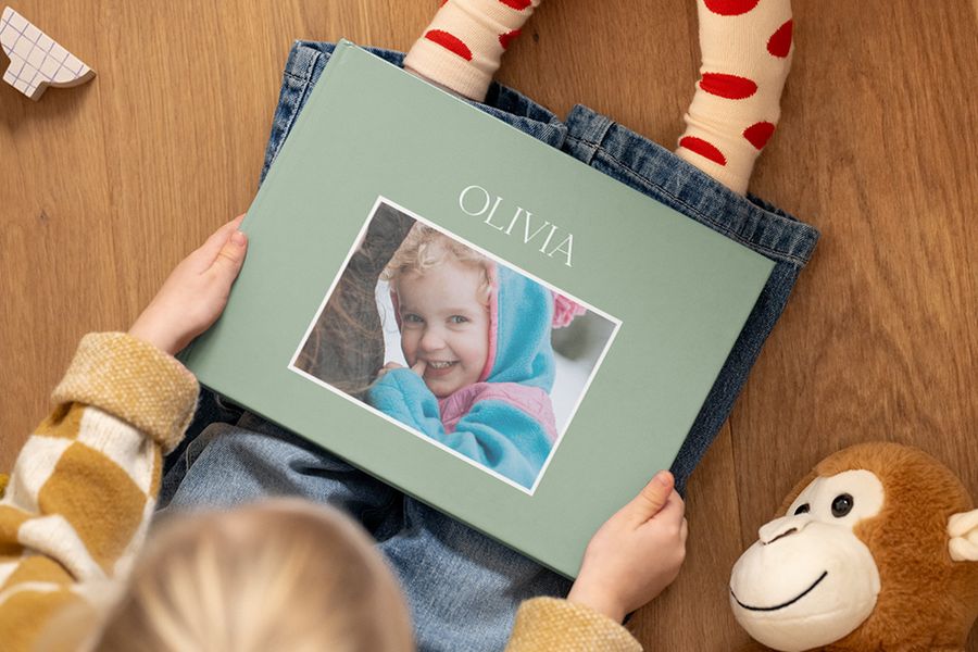 Gepersonaliseerd babyboek van albelli, ideaal om te ontdekken wat te schrijven met quotes baby fotoboek en leuke babyteksten.