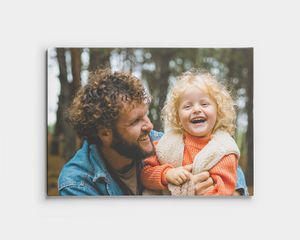 Foto op canvas met lachende vader en kind in het bos