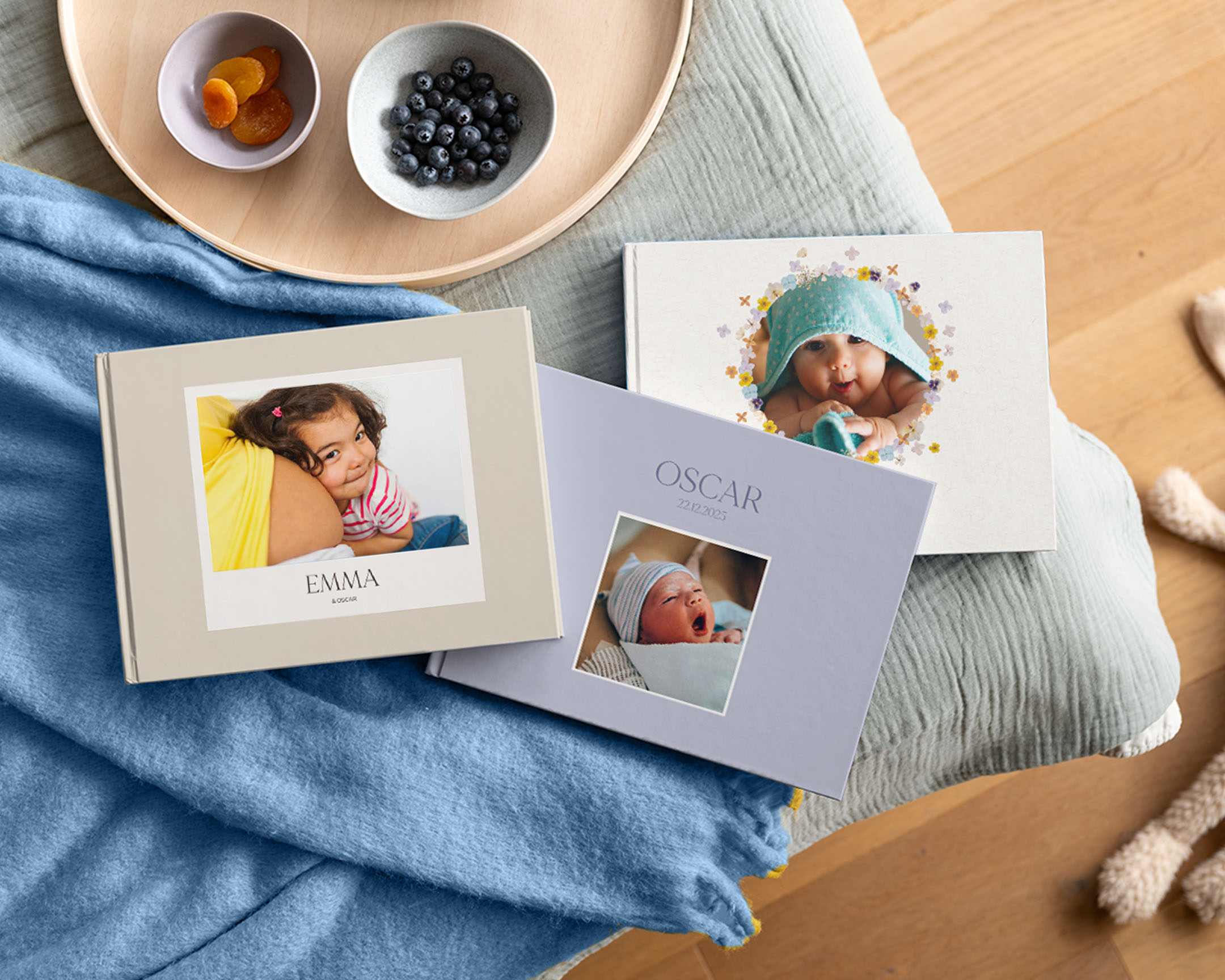 Gepersonaliseerde babyfotoboeken met een babyfoto op de kaft.